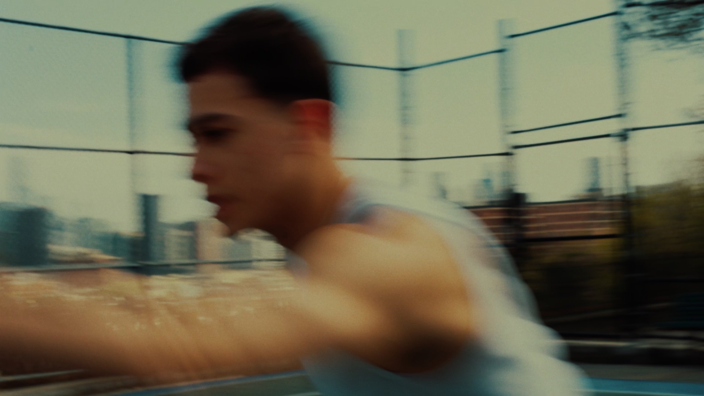 A player moves through frame in motion blur.